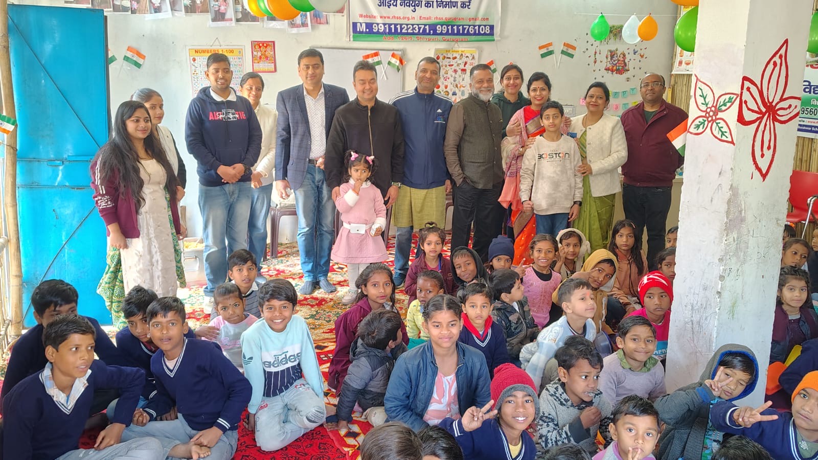 RHSS volunteers and children gathered inside the DLF Ultima centre